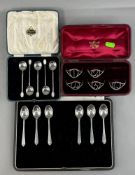 Silver: a boxed set of numbered silver wirework napkin rings by Lawrence Emmanuel, Birmingham 1886, 