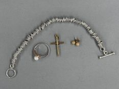 Jewellery: Yellow metal crucifix and textured 4.5mm ball earrings, total weight 1.2g, surface test a