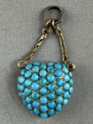 Jewellery: a 19th century yellow metal heart shaped mourning pendant on chain, the front pave set wi