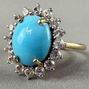 Jewellery: a yellow metal cluster ring, marked 10k and testing a gold, a central 'Sleeping Beauty' t