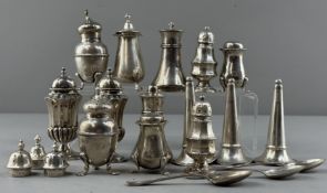 Silver: a number of salt and pepper pots, various dates, together with three spoons and three epergn