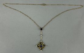 Jewellery: Yellow metal fancy link chain, 42cm long with a 6cm drop attached, topset with a circular