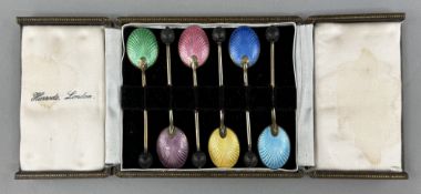Silver: a cased set of six enamelled silver gilt coffee spoons, Birmingham 1958, in Harrods box.