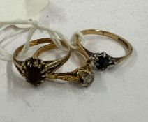 Jewellery: a 9ct yellow gold ring, claw set a single garnet; a 9ct gold ring with an Australian sapp