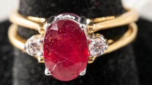 Jewellery: an unusual yellow metal double ring, marked 750 and testing as 18ct gold, hinged to allow