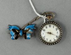 Watches: a Swiss silver gilt cased brooch pin set watch on bow pendant, the dial set with seed pearl