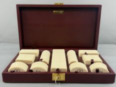 Decorative Arts: a Must De Cartier gaming counter or poker chip set, 200 faux ivory plaques each wit