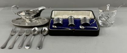 Silver: a plated Mappin and Webb sauce boat, ladle and drip tray; a silver lidded jam pot and spoon;