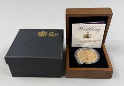 Coins: a Royal Mint produced 22ct gold £5 coin produced to commemorate the wedding of Prince William