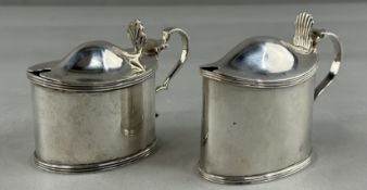 Silver: a Victorian lidded mustard of oval form, London 1892, with leaf shaped thumbpiece and origin
