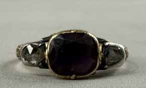 Jewellery: a mid 18th century mourning ring, the unmarked yellow metal band mounted with a central c