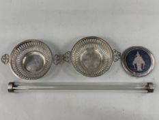 Silver: a pair of pierced nut dishes, Birmingham 1915, 13cm including handles, 81g; a Siamese niello