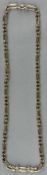Jewellery: a yellow metal fetter link necklace, marked 375 to the clasp and testing as 9ct gold, 50c
