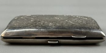 Silver: a curved cigar or cheroot case, Birmingham 1910, gilt interior with all over flower and leaf