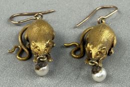 Jewellery: a pair of yellow metal drop earrings in the form of rodents, each with a 3mm cultured pea