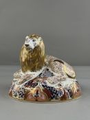 Ceramics: Royal Crown Derby; a boxed paperweight in the form of a reclining lion, a mouse curled up 
