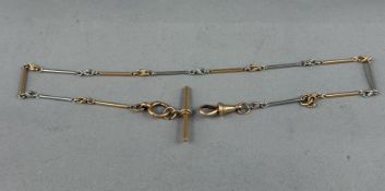 Jewellery: a yellow and white metal Albert chain, the T bar and clip marked 18ct, the bars testing a