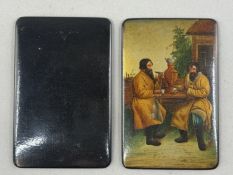 Decorative Arts: a pair of Russian papier mache notebook covers, the front painted with the image of