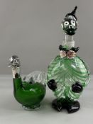 A sterling marked white metal-mounted novelty claret jug, 20th century, modelled in green glass as a