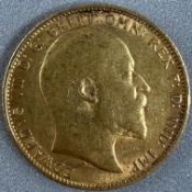 Coins: a 1905 Edward VII full gold sovereign, circulated.