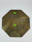 Gardenalia: an octagonal brass or bronze sundial, missing the gnomon, a plaque reading 'L'heure Pass