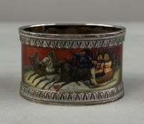 Decorative Arts: a Russian silver napkin ring, first Kokoshnik mark, painted with the image of a tro