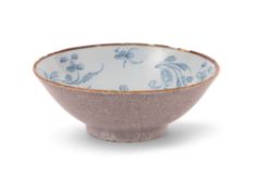 A small and rare delftware bowl, c.1760-70, the flared form painted to the interior with stylised fl