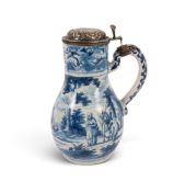 A fine Delft silver-gilt mounted tankard, early 18th century, the baluster body finely painted in bl