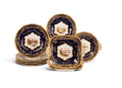 A Coalport part dessert service, c.1900, finely painted with mostly Scottish landscapes, reserved wi