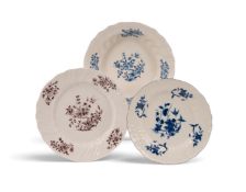 Three Tournai plates or dishes, c.1760-65, each painted with a differing treatment of the diving bir