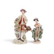Two Derby figures, c.1760-65, the larger of a gardener standing beside a basket of fruit and a flowe