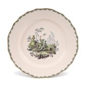 A rare Tournai plate, c.1780, painte3d in green camaieu with a scene of Oriental figures in a garden