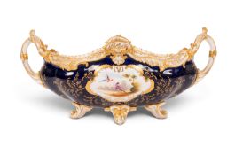 A Coalport jardinière, c.1900, of lobed oval shape, painted with a panel of colourful birds reserved