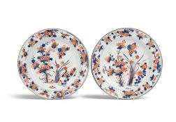 A pair of Chinese Imari chargers, 1st half 18th century, well painted with flowering chrysanthemum a