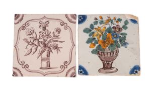 Two Liverpool delftware tiles, c.1750-70, one painted in Fazackerly enamels with a bird perched on a