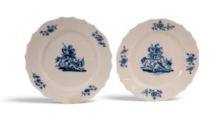 Two Tournai plates, c.1775 and 1820, painted in blue with St George slaying the dragon, the rims wit