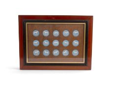 A framed set of fifteen Wedgwood Jasperware plaques and buttons, late 18th century, each circular fo