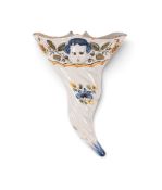 A rare polychrome Liverpool delftware wall pocket, c.1750, of cornucopia form, the upper section mou