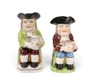 Two Toby jugs, c.1810-40, one Walton and modelled with a large patterned jug of ale, wearing a strip