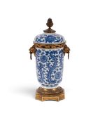 An ormolu-mounted Chinese porcelain blue and white jar and cover, the porcelain Kangxi (1662-1722), 