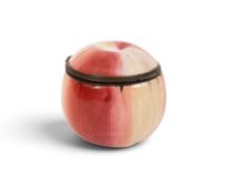 A South Staffordshire enamel fruit bonbonnière, c.1780, modelled as an apple with cream and russet s