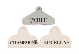 A delftware bin label, c.1770, of coathanger form, inscribed in manganese with 'PORT', and a pair of