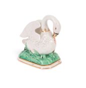 A rare Chamberlain's Worcester figure of the Pelican in her Piety, c.1810-20, the bird modelled with