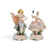 A pair of Derby figures of theatrical dancers, c.1790-1800, she wearing a wide crinoline skirt and h