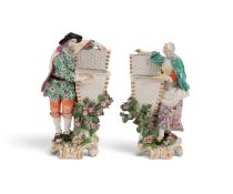 A pair of Chelsea sweetmeat figures, c.1760, modelled as pastry and flower sellers, each standing be