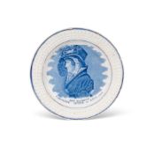 A small commemorative pearlware plate, c.1820, printed in blue with a portrait of Queen Caroline in 