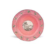 A rare Swansea pearlware plate, c.1820, painted to the well with an en grisaille panel of an open-si