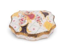 An English enamel snuff box, c.1770-80, of shallow rococo shape, painted with flower sprays on a whi
