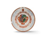 A Chinese porcelain armorial plate for Sir Humphrey Parsons, Kangxi, c.1720, painted with the arms o