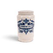 A large Delft drug jar and cover, mid 18th century, the cylindrical form painted in blue with peacoc